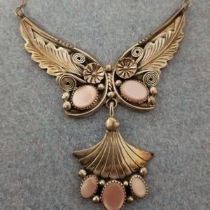 Genuine Sterling Silver necklace and earrings.